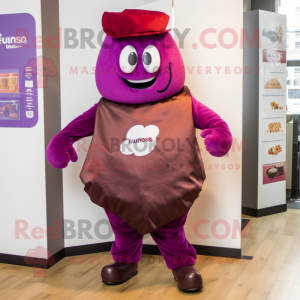 Magenta Chocolates mascot costume character dressed with a Trousers and Brooches