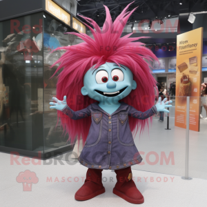 Maroon Witch'S Hat mascot costume character dressed with a Denim Shirt and Hair clips