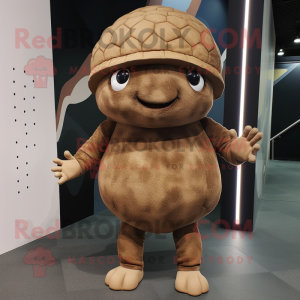 Brown Glyptodon mascot costume character dressed with a Skinny Jeans and Caps