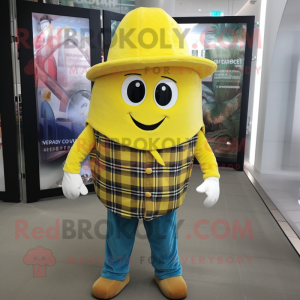 Lemon Yellow Ray mascot costume character dressed with a Flannel Shirt and Hat pins