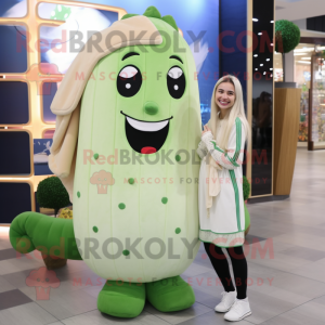 Cream Cucumber mascot costume character dressed with a Romper and Hair clips
