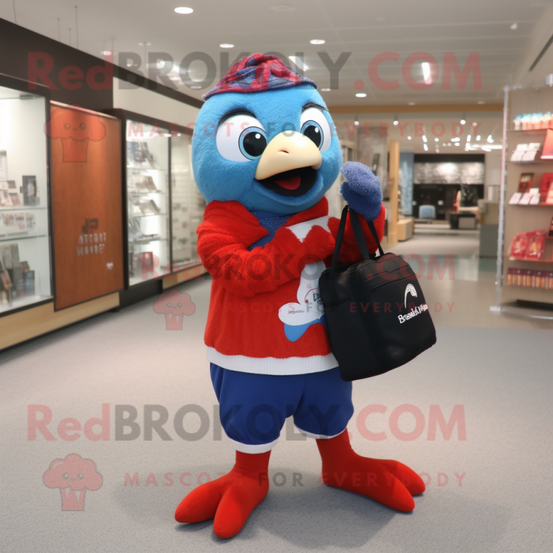 Red Blue Jay mascot costume character dressed with a Cardigan and Handbags