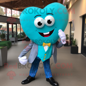 Turquoise Heart mascot costume character dressed with a Suit Pants and Tie pins