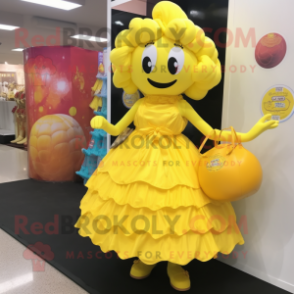 Yellow Candy Box mascot costume character dressed with a Ball Gown and Tote bags