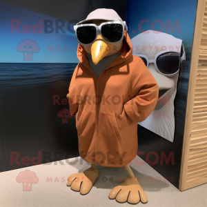 Brown Gull mascot costume character dressed with a Hoodie and Sunglasses