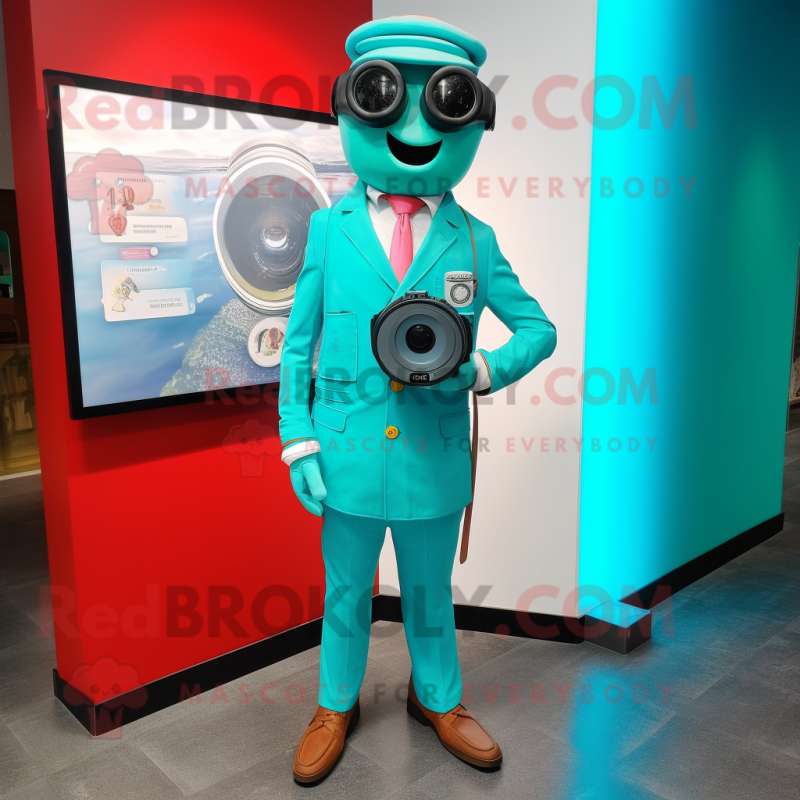 Turquoise Camera mascot costume character dressed with a Blazer and Digital watches