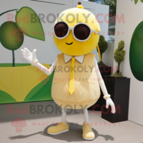 Tan Lemon mascot costume character dressed with a A-Line Dress and Sunglasses
