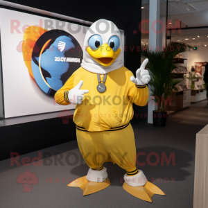 Gold Gull mascot costume character dressed with a Hoodie and Smartwatches