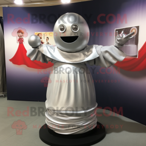 Silver Human Cannon Ball mascot costume character dressed with a Empire Waist Dress and Wraps