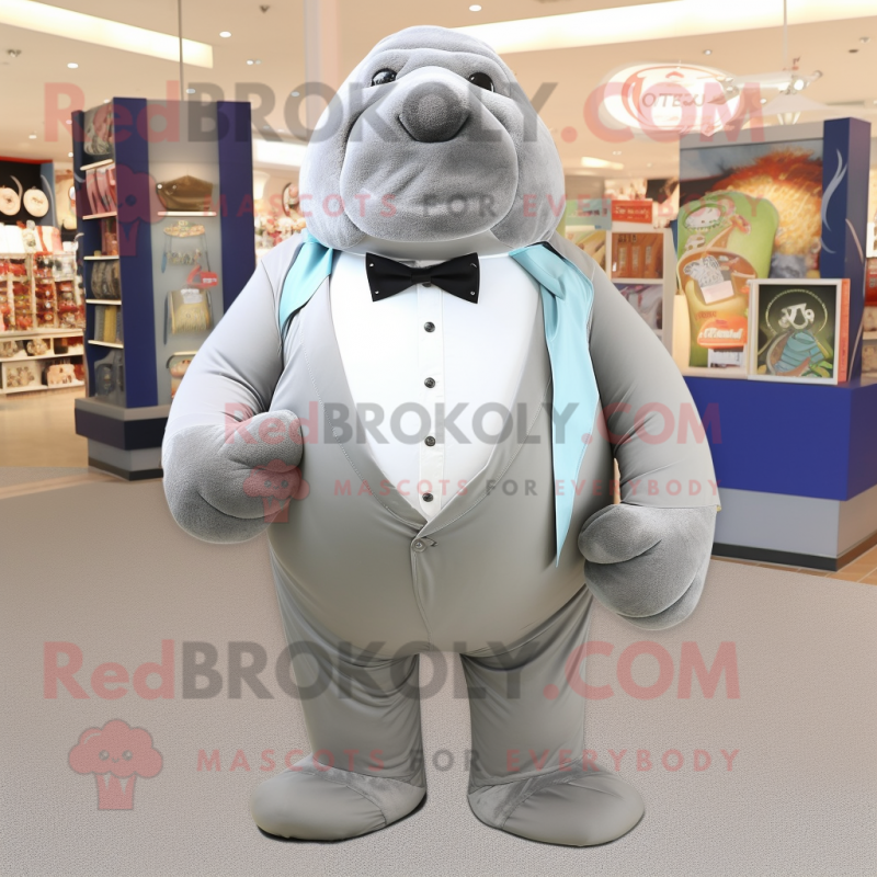 Silver Walrus mascot costume character dressed with a T-Shirt and Bow ties