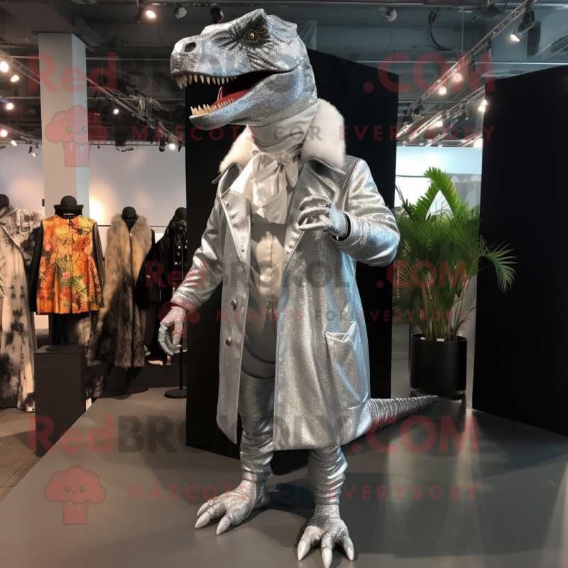 Silver T Rex mascot costume character dressed with a Coat and Earrings