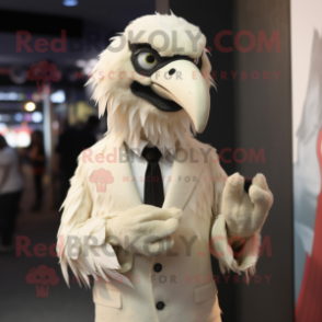 Cream Vulture mascot costume character dressed with a Suit and Lapel pins