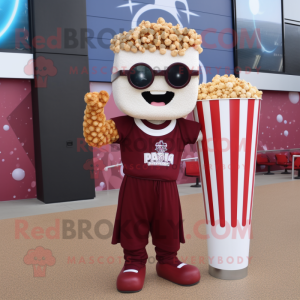 Maroon Pop Corn mascot costume character dressed with a T-Shirt and Wraps