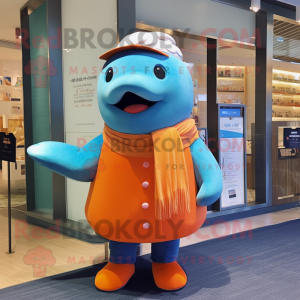 Orange Blue Whale mascot costume character dressed with a Cardigan and Berets