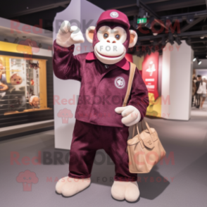 Maroon Chimpanzee mascot costume character dressed with a Chinos and Handbags