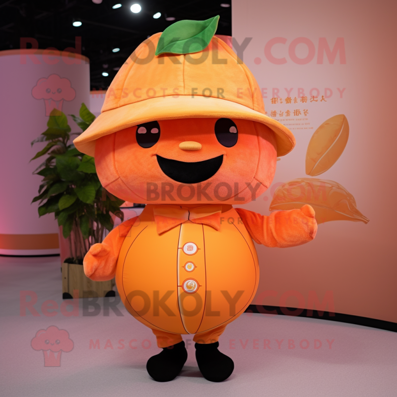 Peach Mandarin mascot costume character dressed with a Graphic Tee and Hats