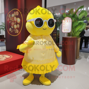 Lemon Yellow Dim Sum mascot costume character dressed with a Dress and Sunglasses