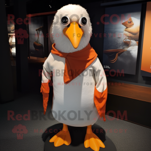 Rust Seagull mascot costume character dressed with a Polo Shirt and Shawl pins