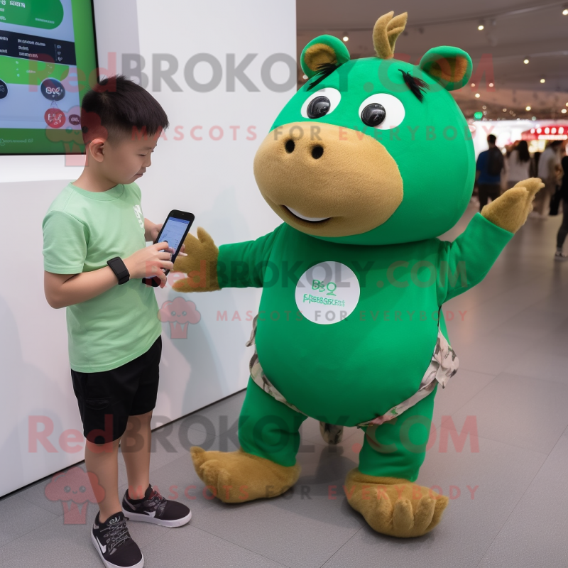 Green Capybara mascot costume character dressed with a Romper and Smartwatches