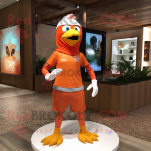 Orange Dove mascot costume character dressed with a Rash Guard and Headbands