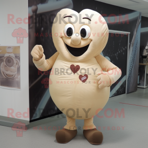 Beige Heart mascot costume character dressed with a Trousers and Rings