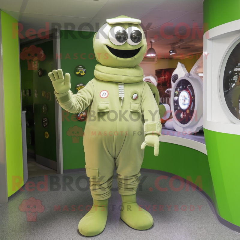Olive Astronaut mascot costume character dressed with a Playsuit and Shoe laces