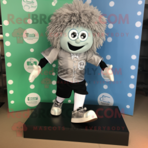 Silver Irish Dancing Shoes mascot costume character dressed with a Oxford Shirt and Coin purses