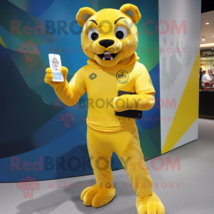 Yellow Puma mascot costume character dressed with a Rash Guard and Wallets