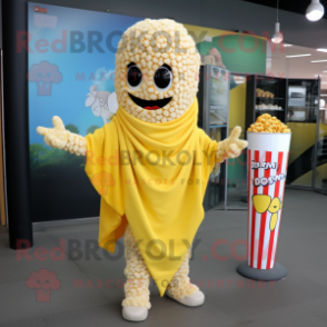 Yellow Pop Corn mascot costume character dressed with a Cover-up and Scarf clips