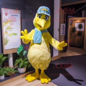 Yellow Pigeon mascot costume character dressed with a Dungarees and Gloves