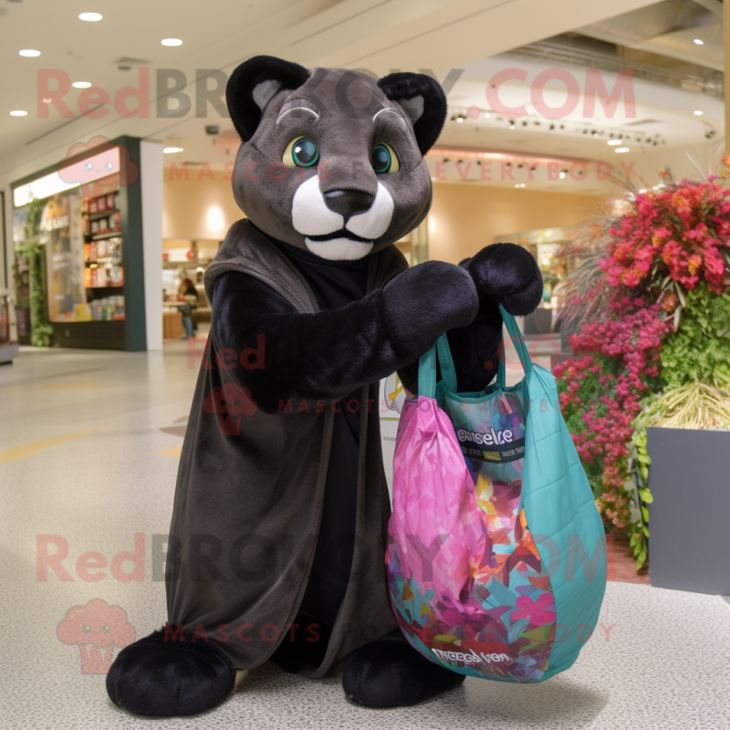 Black Mountain Lion mascot costume character dressed with a Cover-up and Handbags