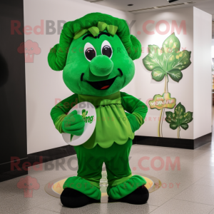 Green Bunch Of Shamrocks mascot costume character dressed with a T-Shirt and Shawl pins