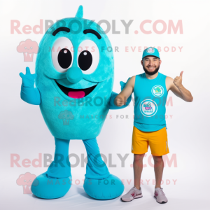 Turquoise Paella mascot costume character dressed with a Board Shorts and Digital watches