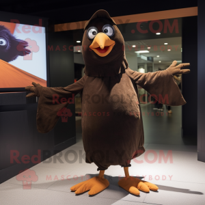 Brown Blackbird mascot costume character dressed with a Skinny Jeans and Wraps