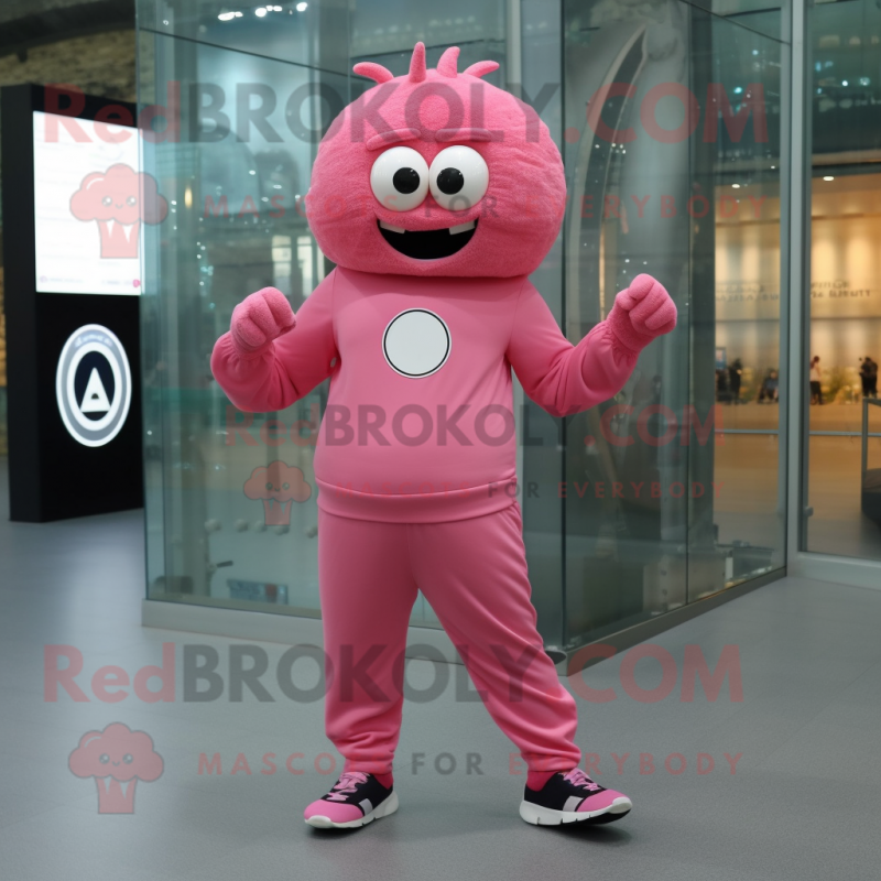 Pink Cyclops mascot costume character dressed with a Joggers and Brooches