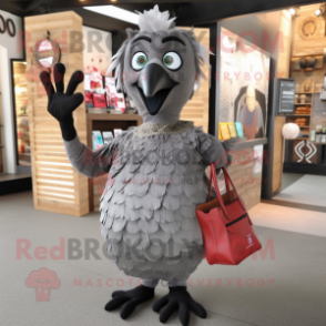 Gray Tandoori Chicken mascot costume character dressed with a Shift Dress and Messenger bags