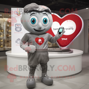 Gray Heart mascot costume character dressed with a T-Shirt and Digital watches