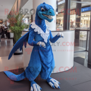 Blue Utahraptor mascot costume character dressed with a Mini Dress and Shawl pins