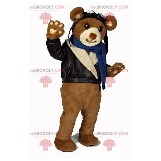 Mascote urso de pelúcia marrom em roupa de motociclista -