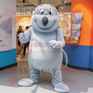 Silver Walrus mascot costume character dressed with a Romper and Cummerbunds