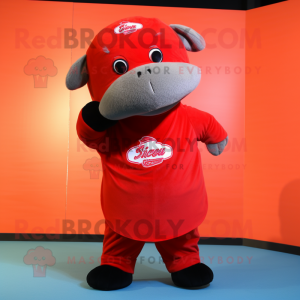 Red Stellar'S Sea Cow mascot costume character dressed with a Baseball Tee and Earrings
