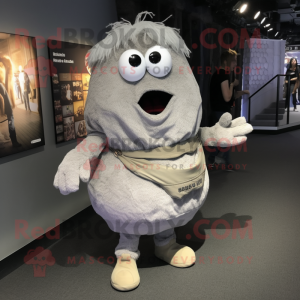Silver Potato mascot costume character dressed with a Jeans and Shoe laces