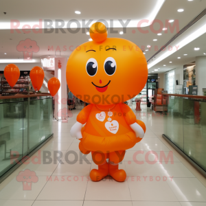 Orange Heart Shaped Balloons mascot costume character dressed with a Dress and Bracelet watches