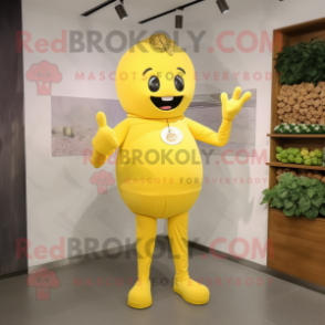 Yellow Grape mascot costume character dressed with a Long Sleeve Tee and Belts