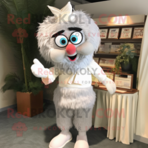Silver Candy Box mascot costume character dressed with a Corduroy Pants and Reading glasses