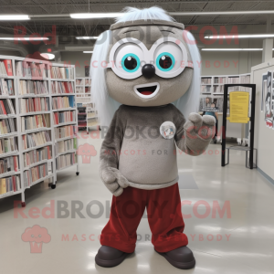 Silver Candy Box mascot costume character dressed with a Corduroy Pants and Reading glasses