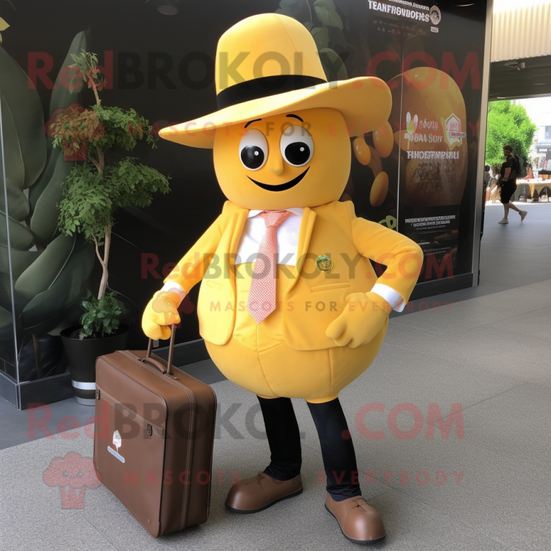 Gold Grapefruit mascot costume character dressed with a Oxford Shirt and Wallets