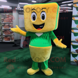 Green Grilled Cheese Sandwich mascot costume character dressed with a Jumpsuit and Messenger bags