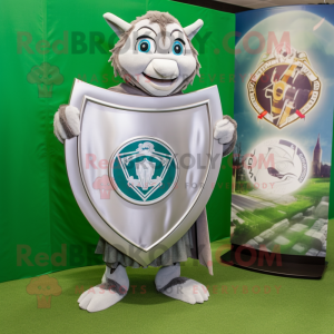Silver Celtic Shield mascot costume character dressed with a Graphic Tee and Pocket squares