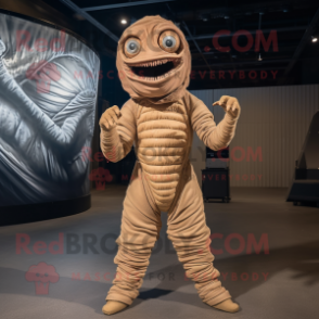 Tan Trilobite mascot costume character dressed with a Jumpsuit and Wraps